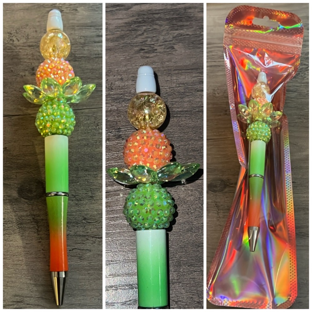 Handmade green and orange beaded pen